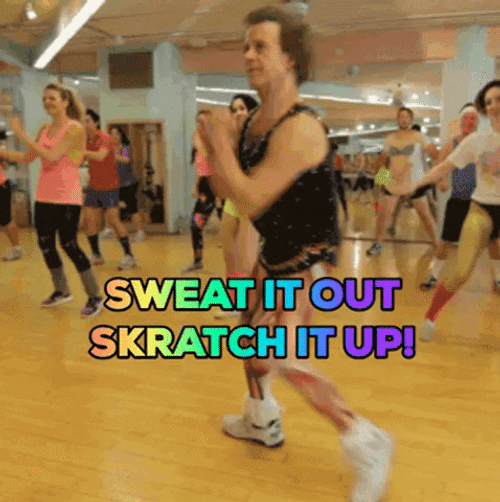 Richard Simmons Sweating It Out During Aerobics Session GIF