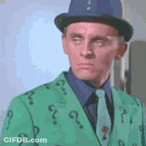 Riddler Fixing Tie GIF