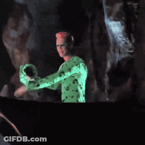 Riddler Holding His Mask GIF