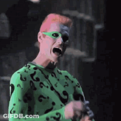 Riddler Jokingly Throws The Bomb GIF