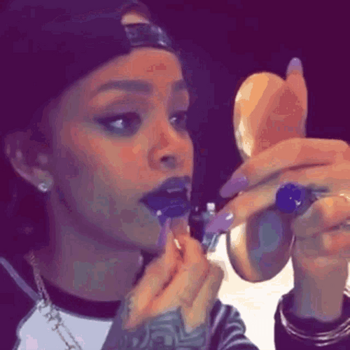 Rihanna Putting On Lipstick GIF