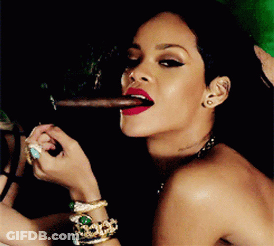 Rihanna Smoking Cigar And Wink GIF