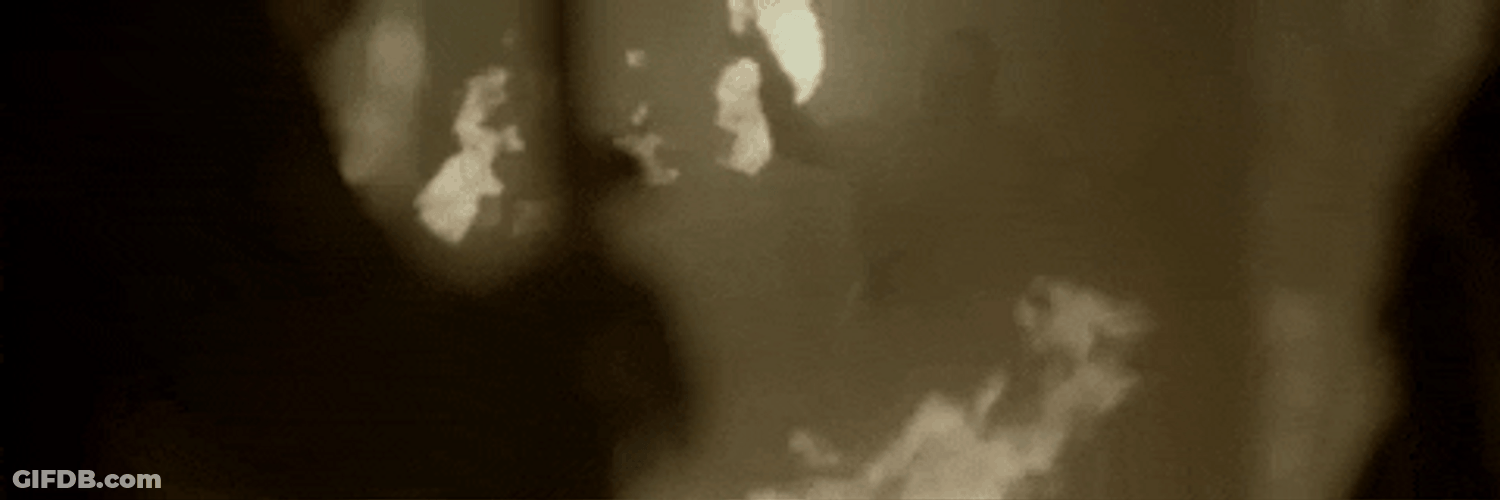 Riot Throwing Flames Around GIF
