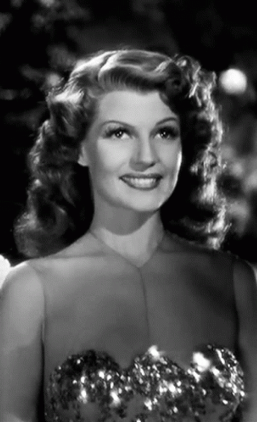 Rita Hayworth Smile Looking Down GIF