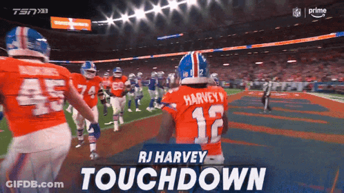 RJ Harvey Football Player On Field With Others GIF