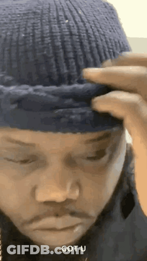 Robber Covering Face Wearing Balaclava GIF