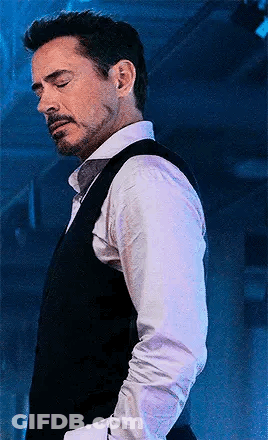 Robert Downey Jr. In White Shirt Black Vest And Tie GIF
