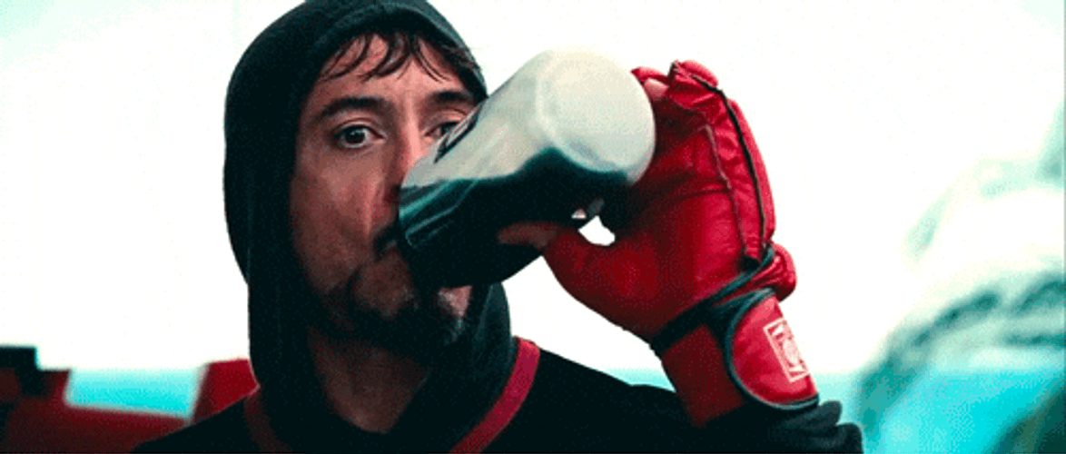 Robert Downey Jr Iron Man Suit Up Drinking Cola GIF