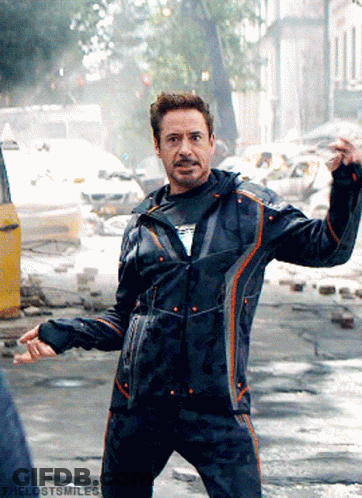 Robert Downey Jr. Is Wearing A Black Jacket And Pants GIF