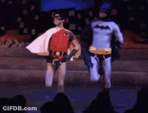Robin And Batman Walking On Stage GIF