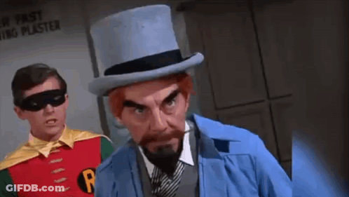 Robin And Penguin Standing Together Penguin In Top Hat And Tie GIF