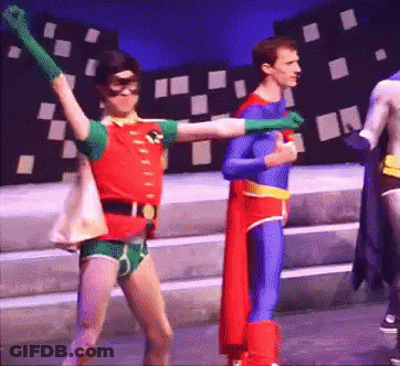 Robin And Superman Dancing On Stage GIF