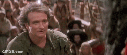Robin Williams Standing Front Of Crowd Looking At Camera GIF