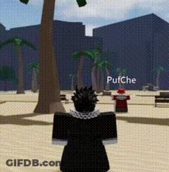 Roblox Character Standing In Sandy Area With Palm Trees GIF