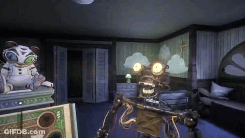 Robot And Stuffed Animal On Table GIF