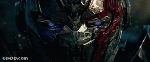 Robot Face Close Up With Blue Eyes GIF