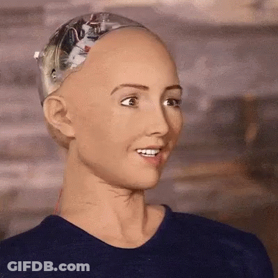 Robot Face Close Up With Blue Shirt GIF