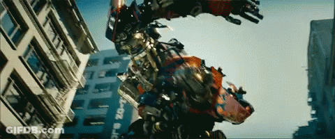 Robot Flying Past Building Saying 20-1 GIF