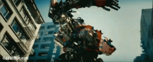 Robot Flying Through City GIF