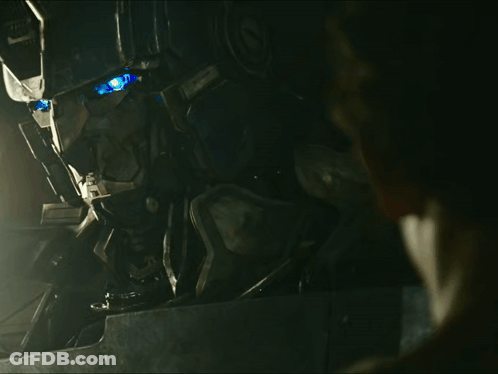 Robot Head With Blue Eyes And Letters CC GIF