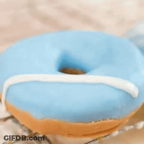 Robot Holding Donut With Donuts Sign GIF