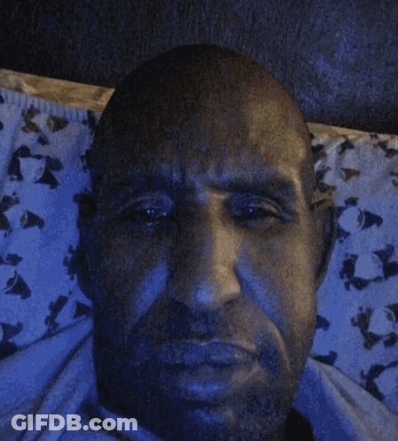 Robot In Blue And Yellow Shirt With WM400 GIF