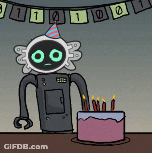 Robot Next To Cake With Candles GIF