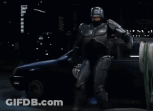 Robot Next To Car Saying Drop It GIF