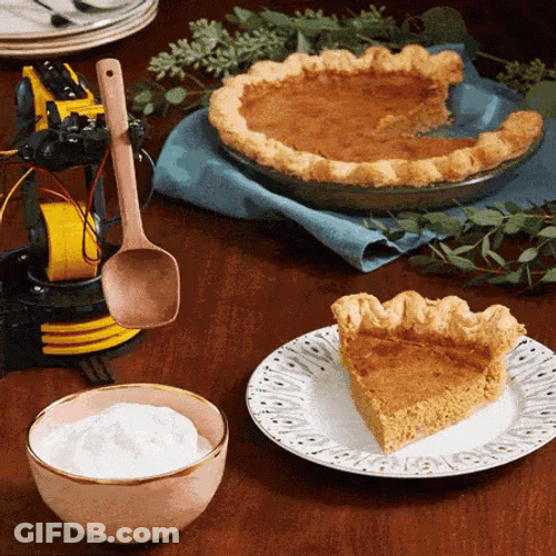 Robot Putting Whipped Cream On Cake GIF