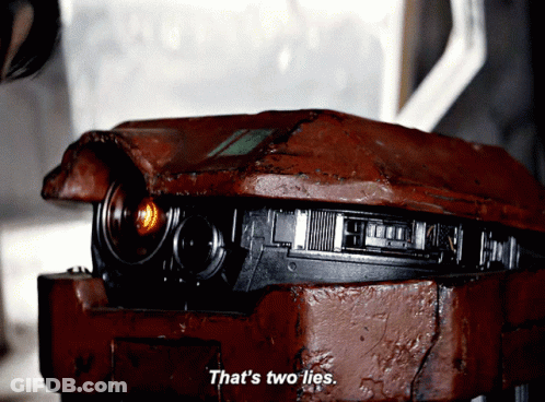 Robot Says That's Two Lies In Front Of Another Robot GIF