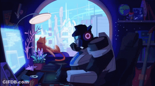 Robot Sitting In Front Of Computer Screen GIF