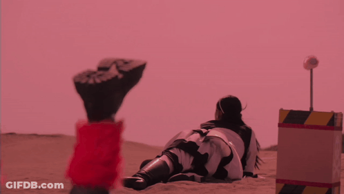 Robot Standing Before Red Lantern Building GIF