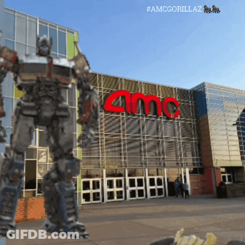 Robot Standing In Front Of AMC Theater GIF