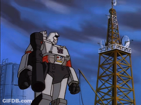 Robot Standing In Front Of Tower With Satellite Dishes GIF