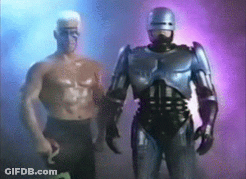 Robot Standing Next To Shirtless Man GIF