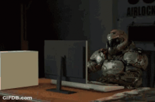 Robot Statue Holding Box GIF