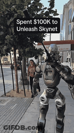 Robot Walking Down Sidewalk Spent $100K To Unleash Skynet GIF