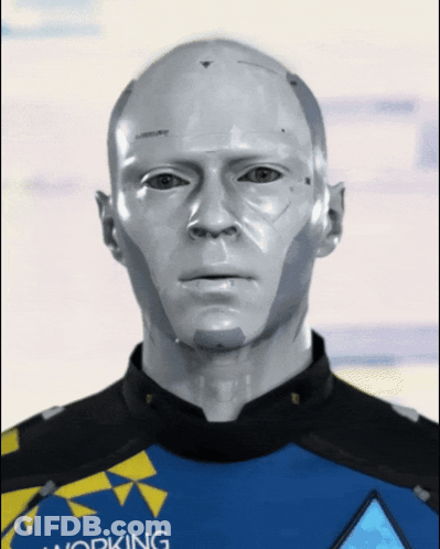 Robot Wearing Blue And Yellow Shirt Saying Working GIF