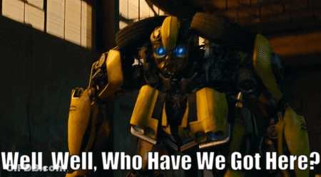 Robot With Blue Eyes Saying Well Well Who Have We Got Here GIF