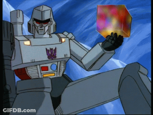 Robot With Butterfly On Chest Holding Cube GIF