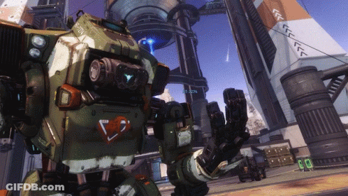 Robot With Heart On Chest Facing Building GIF