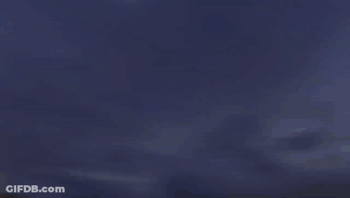 Robot With Purple Light Coming Out Of Mouth GIF