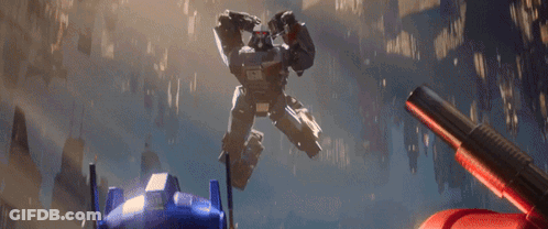 Robot With Red Eyes Fighting Another Robot With Gun GIF