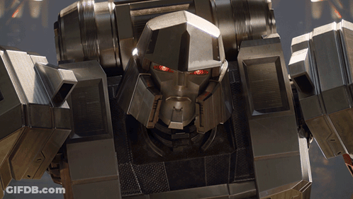 Robot With Red Eyes Saying Transformers GIF