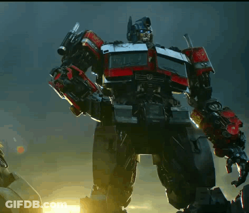 Robot With Transformers On Chest GIF