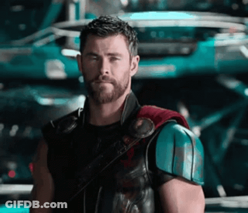Robotic Arm Reaching For Skull In Dark Room GIF