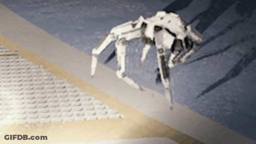 Robotic Hand Reaching On Gray Surface GIF