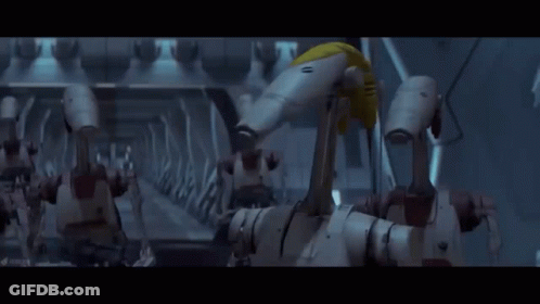 Robots Standing In Room GIF