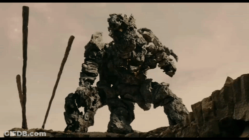 Rock Monster Statue On Hillside GIF