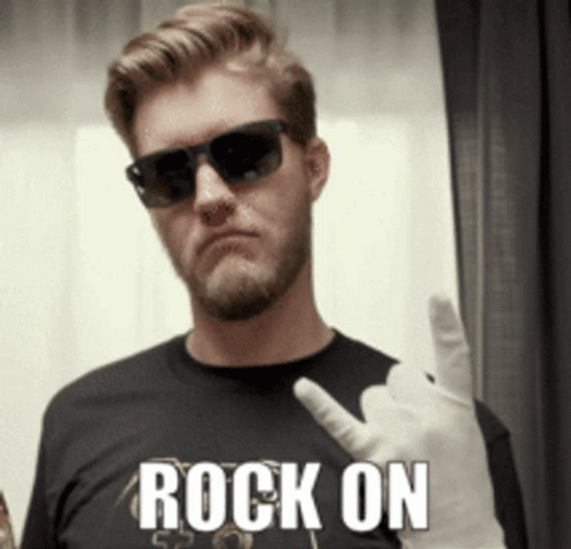 Rock On Gesture By A Man In Gloves GIF